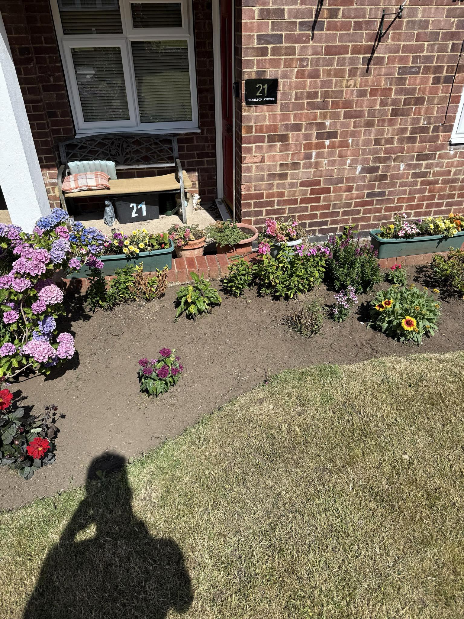 After garden makeover - cleaned flower beds and fresh lawn 1